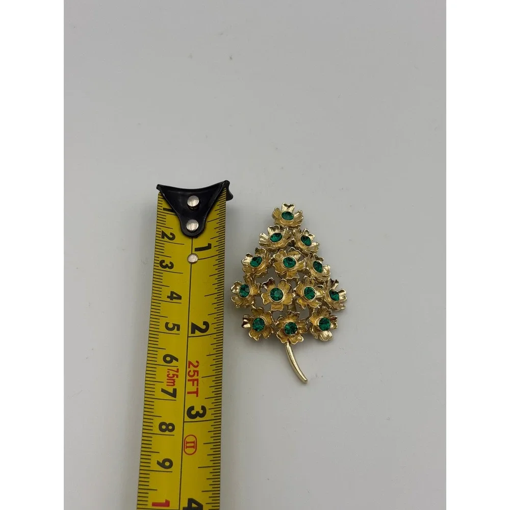 Vintage Gold Tone Christmas Tree Brooch Green Rhinestone Floral Holiday Pin